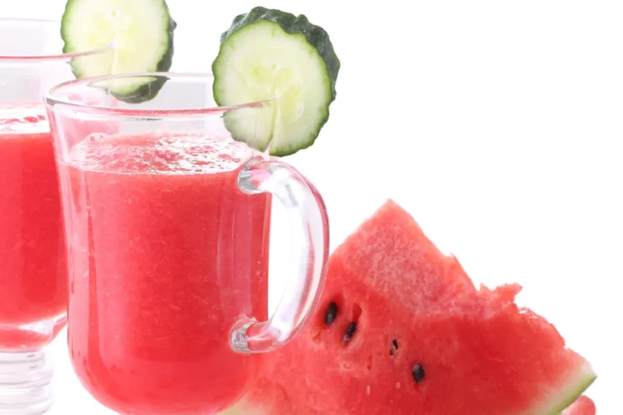 hydrating watermelon juice with cucumber slices in glasses